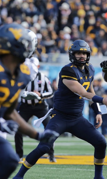 Grier throws for 3 TDs, No. 7 West Virginia beats TCU 47-10